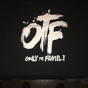 Only The Family OTF Brushstroke Logo on Black Fabric HD phone wallpaper