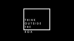Minimalist Think Outside The Box Quote on Black Background HD wallpaper