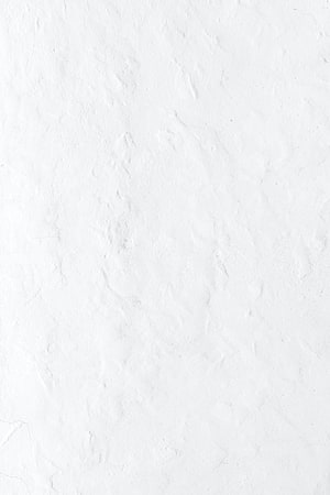Minimalist White Plaster Wall Texture with Subtle Organic Surface Details HD phone wallpaper