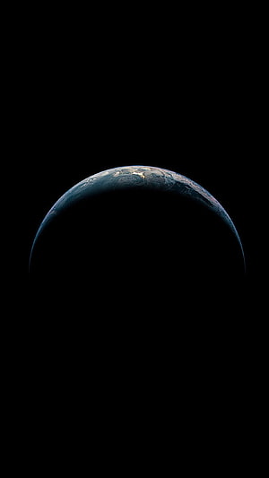 Earth Horizon Rising From Deep Space Against Black Void HD phone wallpaper