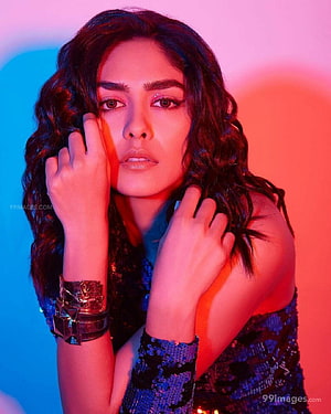 Mrunal Thakur in a Sequined Dress with Neon Pink and Blue Lighting HD phone wallpaper