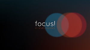 Minimalist Dark Background with Colorful Bokeh Circles and Motivational Focus Text HD wallpaper