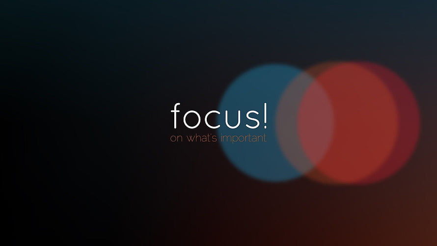 Minimalist Dark Background with Colorful Bokeh Circles and Motivational Focus Text HD wallpaper