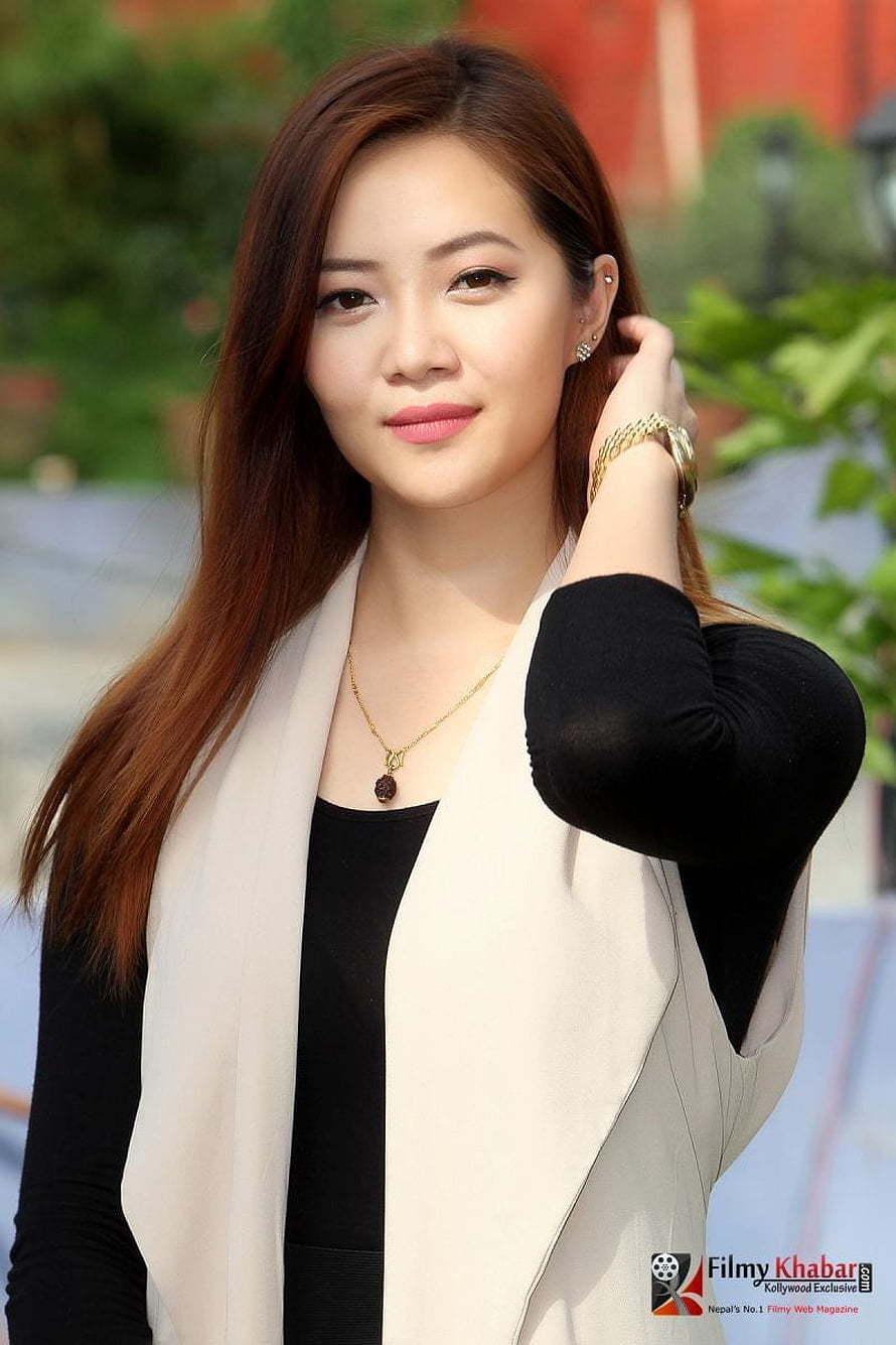 Jassita Gurung Nepali Actress in Black Top and White Vest with Gold Jewelry HD phone wallpaper