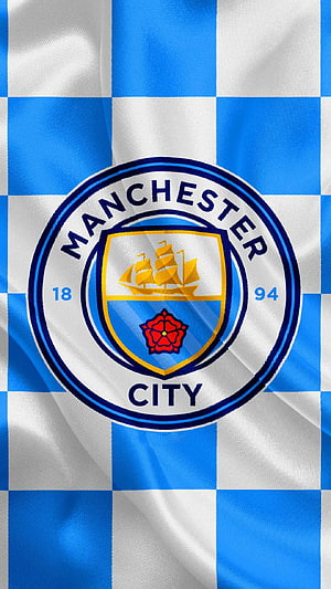 Manchester City FC Crest on Blue and White Checkered Fabric Background HD phone wallpaper