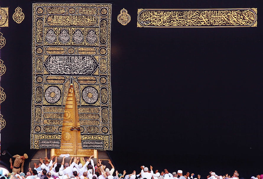 Golden Kaaba Door and Kiswa in Mecca with Pilgrims Reaching Toward the Sacred House HD wallpaper