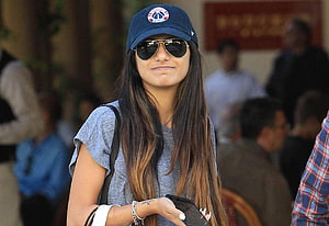 Mia Khalifa Wearing a Blue Cap and Aviator Sunglasses in a Casual Gray T-Shirt HD wallpaper