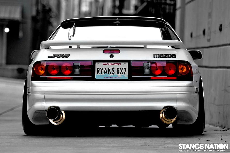 Rear View of a White Mazda RX-7 FC with Gold Exhaust Tips and Custom Taillights HD wallpaper
