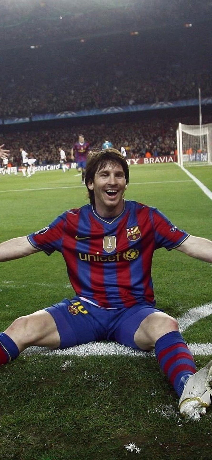 Lionel Messi Celebrating in Barcelona Home Kit on the Pitch HD phone wallpaper