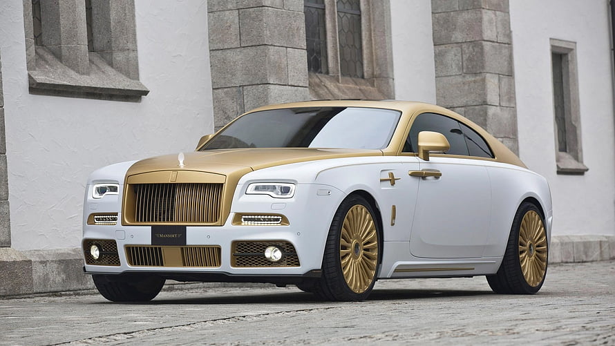 White and Gold Rolls Royce Wraith Luxury Coupe Parked on Cobblestone Street HD wallpaper