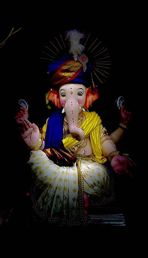 Ornate Ganesha Idol in Traditional Attire with Turban and Jewels on Black Background HD phone wallpaper