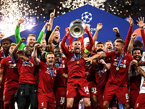 Liverpool FC Players Celebrating Champions League Victory With Trophy And Fireworks HD wallpaper