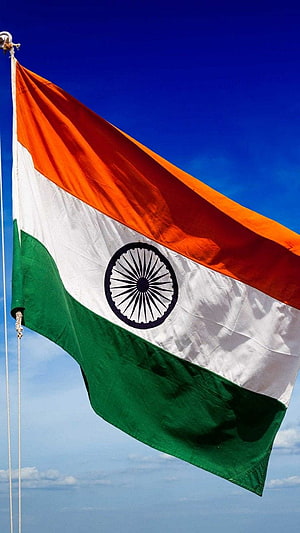 Indian National Flag Waving Against a Clear Blue Sky with Ashoka Chakra HD phone wallpaper