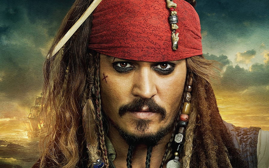 Captain Jack Sparrow Close-Up Portrait with Red Bandana and Pirate Ship at Sunset HD wallpaper