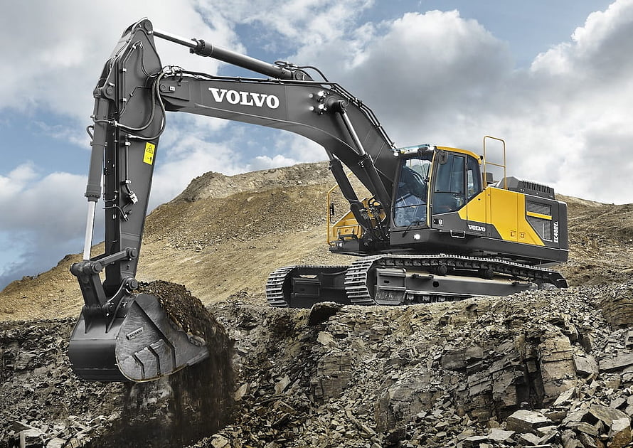 Volvo EC450E Excavator Digging in a Rocky Quarry Site HD wallpaper