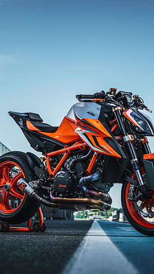 KTM 1290 Super Duke R EVO Orange Naked Motorcycle on Asphalt Track HD phone wallpaper