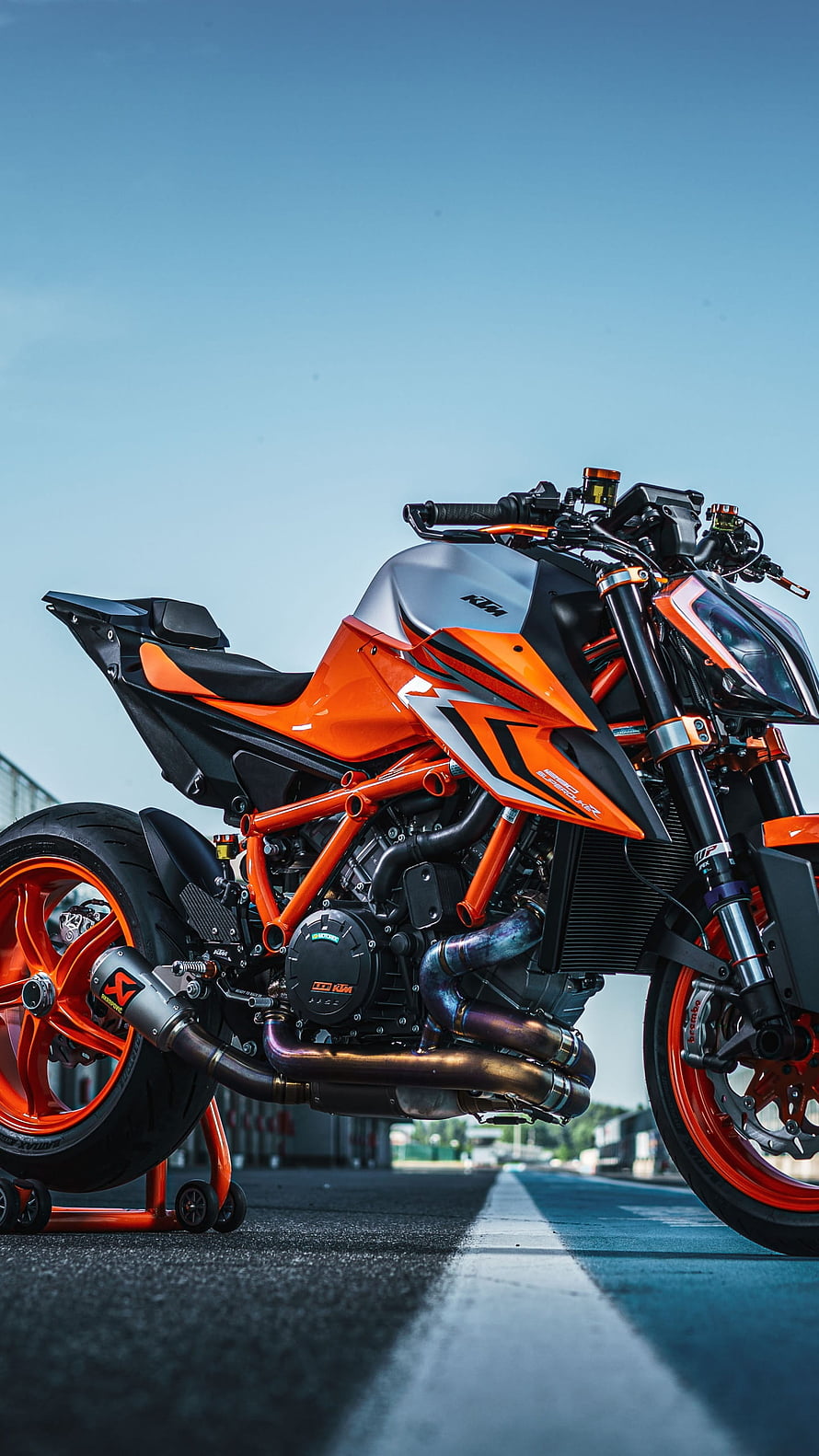 KTM 1290 Super Duke R EVO Orange Naked Motorcycle on Asphalt Track HD phone wallpaper