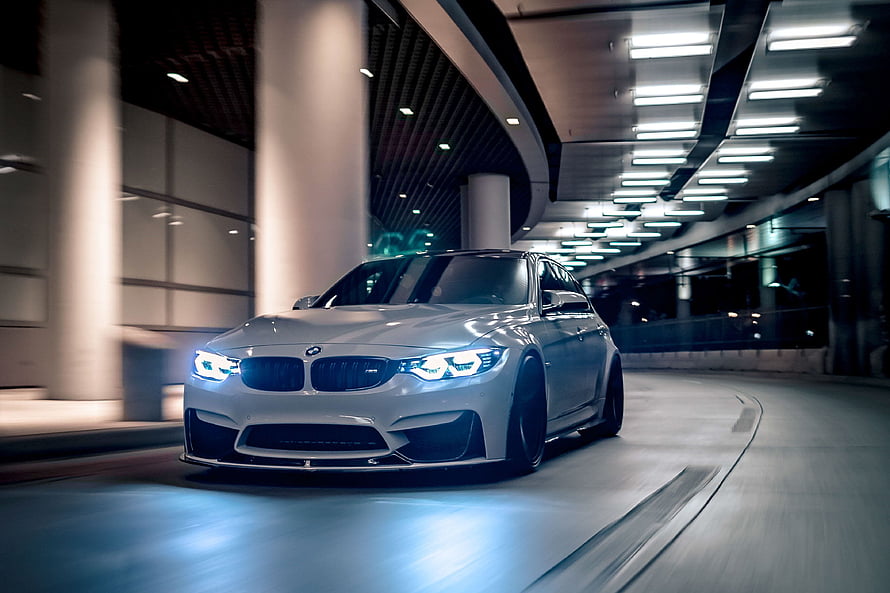 White BMW M3 F80 Sedan Driving Through Modern Underground Tunnel HD wallpaper