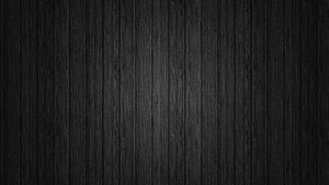 Dark Charcoal Wood Plank Texture Background with Vertical Grain Pattern HD wallpaper