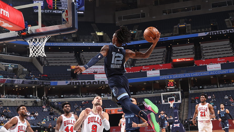 Ja Morant Soaring for a Powerful One-Handed Dunk Against the Chicago Bulls HD wallpaper