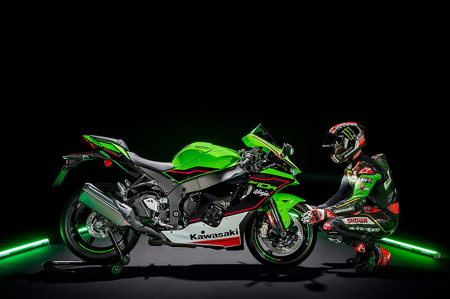 Kawasaki Ninja ZX-10R Racing Motorcycle with Rider in Green and Black Livery HD wallpaper