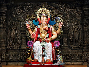 Lalbaugcha Raja Ganesha Murti in Ornate Temple Setting with Traditional Decorations HD wallpaper