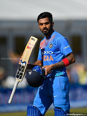 KL Rahul in India Cricket Jersey Holding Bat and Helmet on the Field HD phone wallpaper