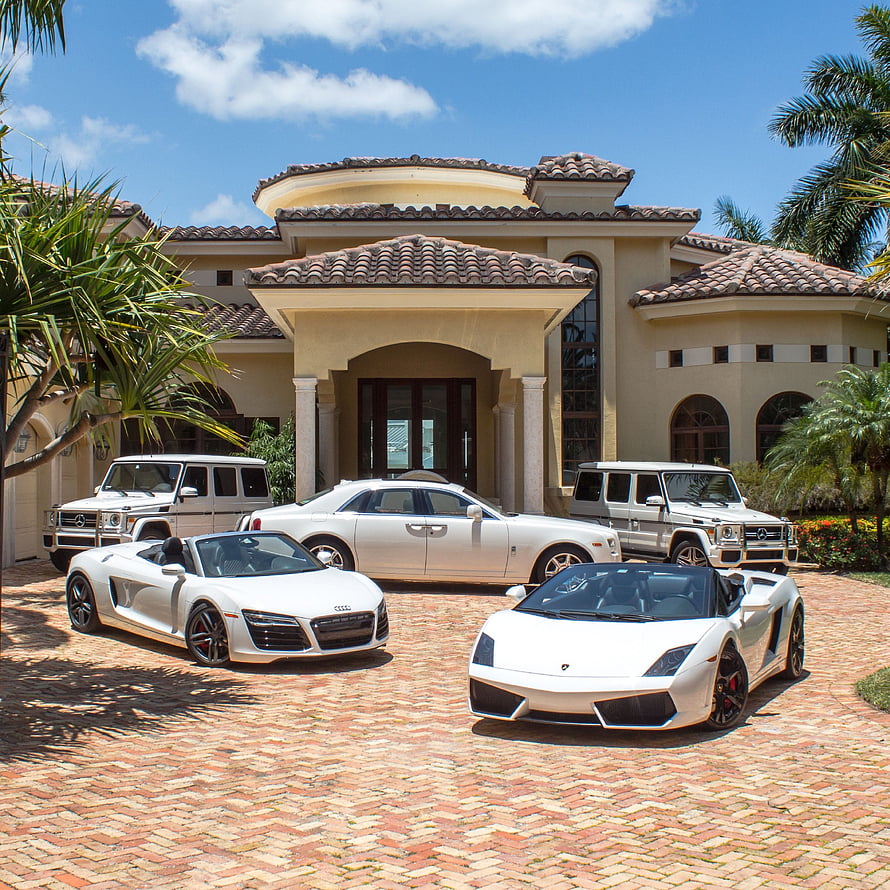 Luxury Supercars and SUVs Parked in Front of a Mediterranean Style Mansion HD phone wallpaper