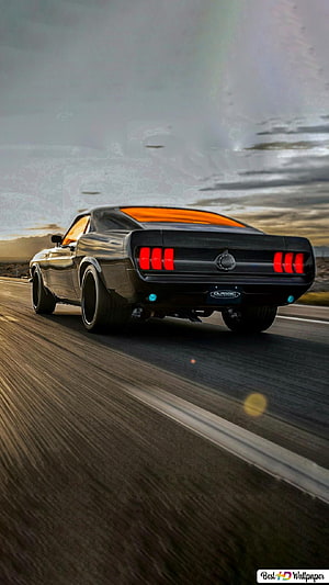 1969 Ford Mustang Boss 429 Rear View on Open Highway at Dusk HD phone wallpaper
