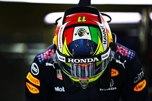 Sergio Perez Red Bull Racing Helmet with Mexican Flag and Honda Sponsorship HD wallpaper