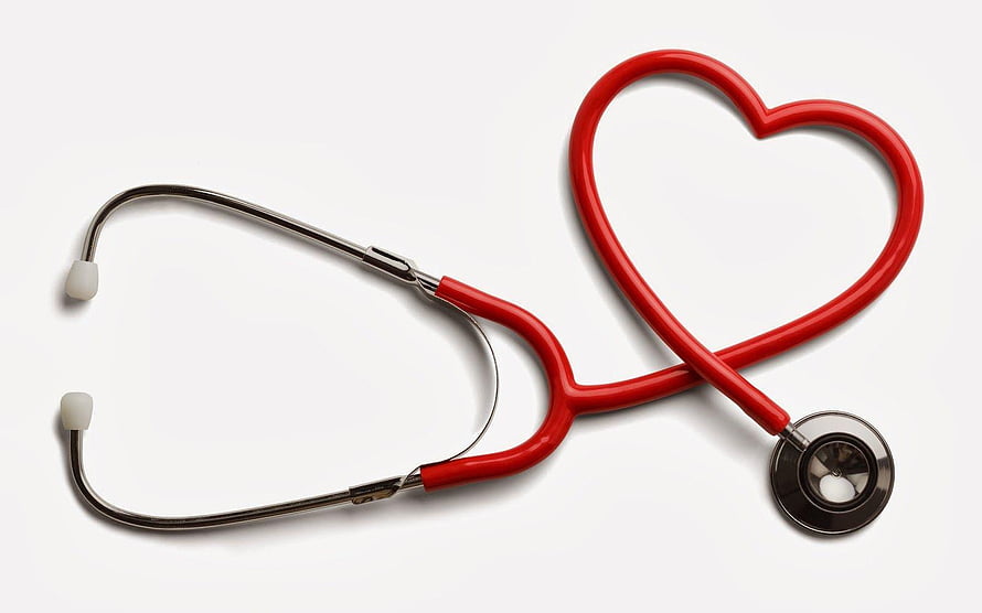 Red stethoscope arranged in a heart shape on a white background HD wallpaper