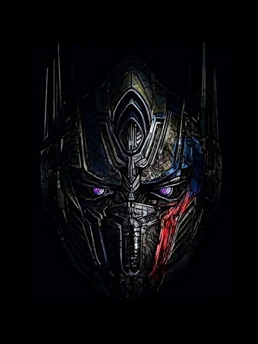Optimus Prime Dark Metallic Face Close-Up with Glowing Purple Eyes and Red Accent HD phone wallpaper