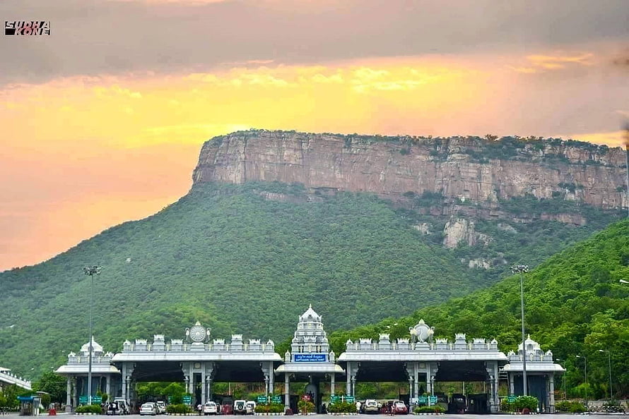 Tirumala Temple Gateway at Sunset with Sacred Hill in the Background HD wallpaper