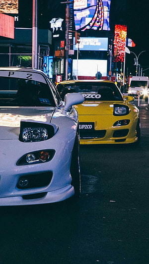 Mazda RX-7 street cars parked in a neon-lit city at night HD phone wallpaper