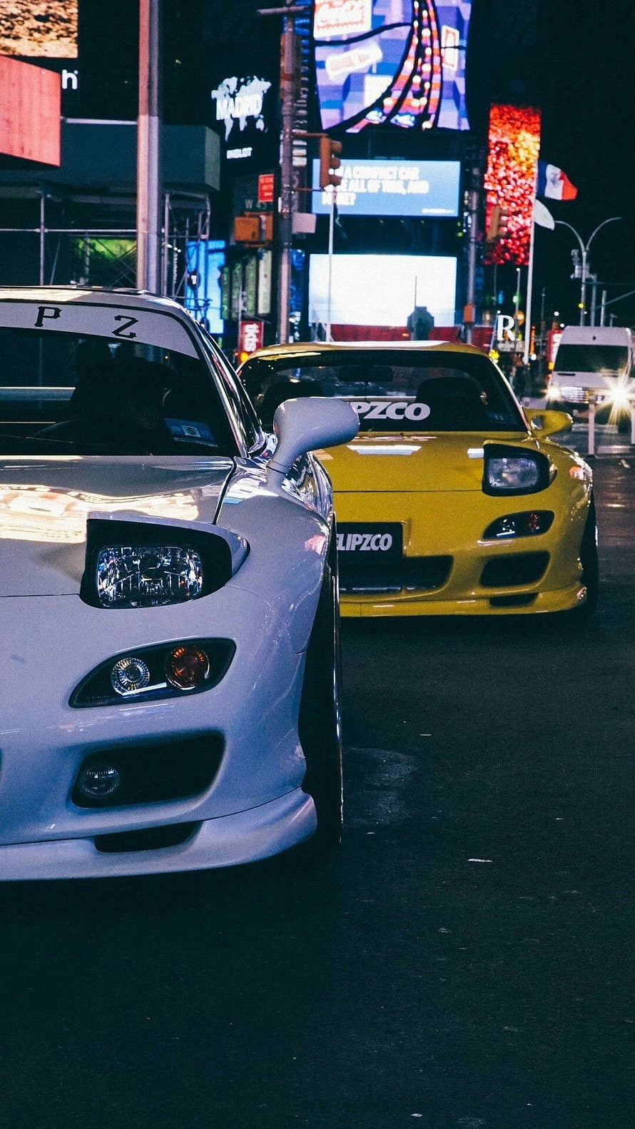 Mazda RX-7 street cars parked in a neon-lit city at night HD phone wallpaper