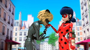 Miraculous Ladybug and Cat Noir Kissing Scene in Parisian Cityscape HD wallpaper