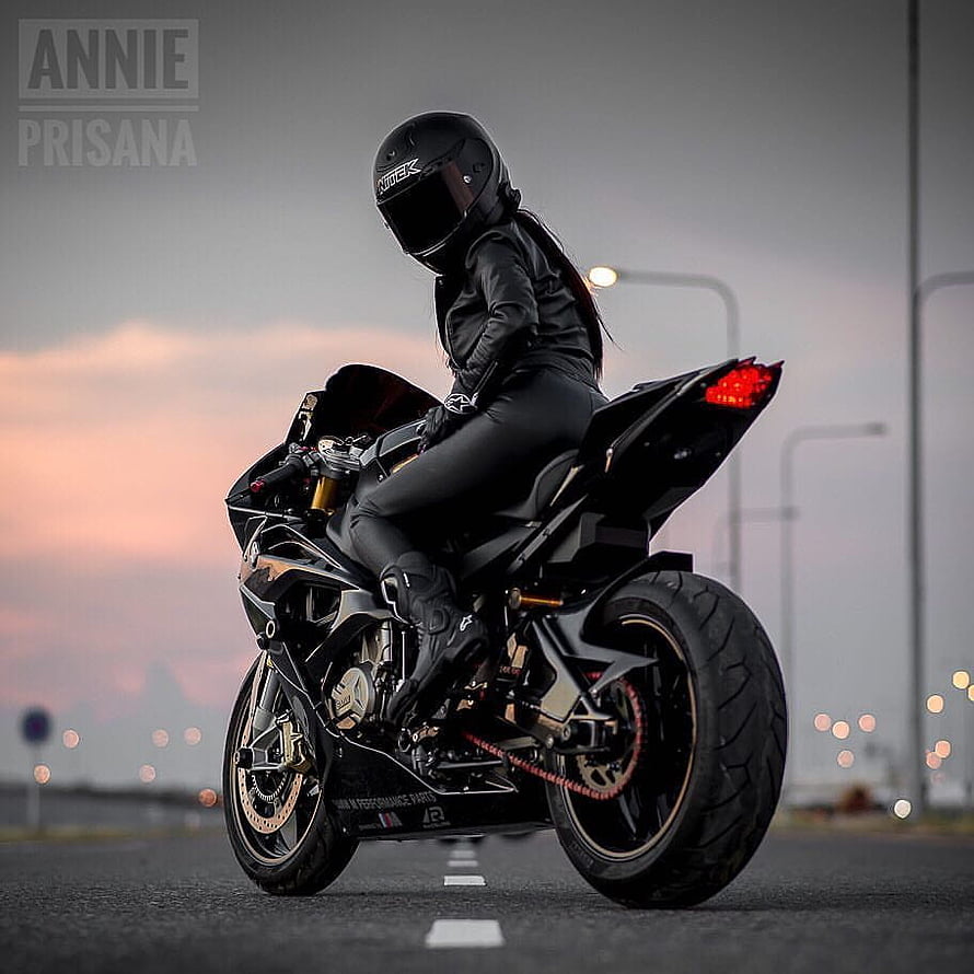Female Rider in Black Leather Gear on a Sport Motorcycle at Dusk HD phone wallpaper