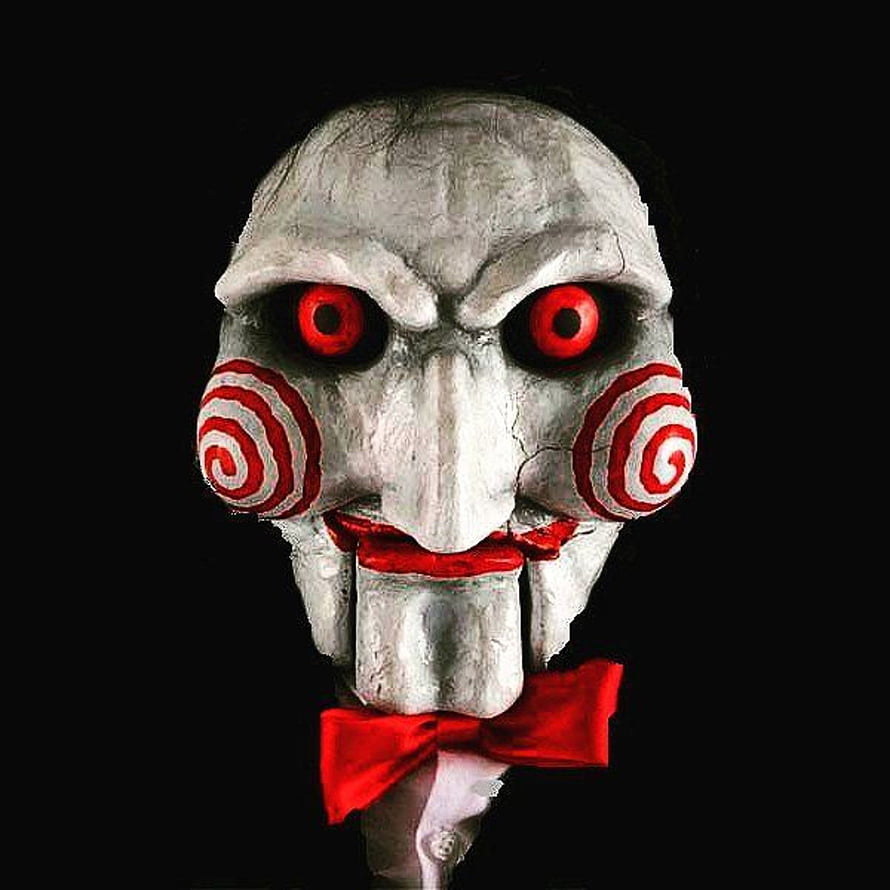 Jigsaw Mask with Red Spiral Cheeks and Bow Tie on Black Background HD phone wallpaper