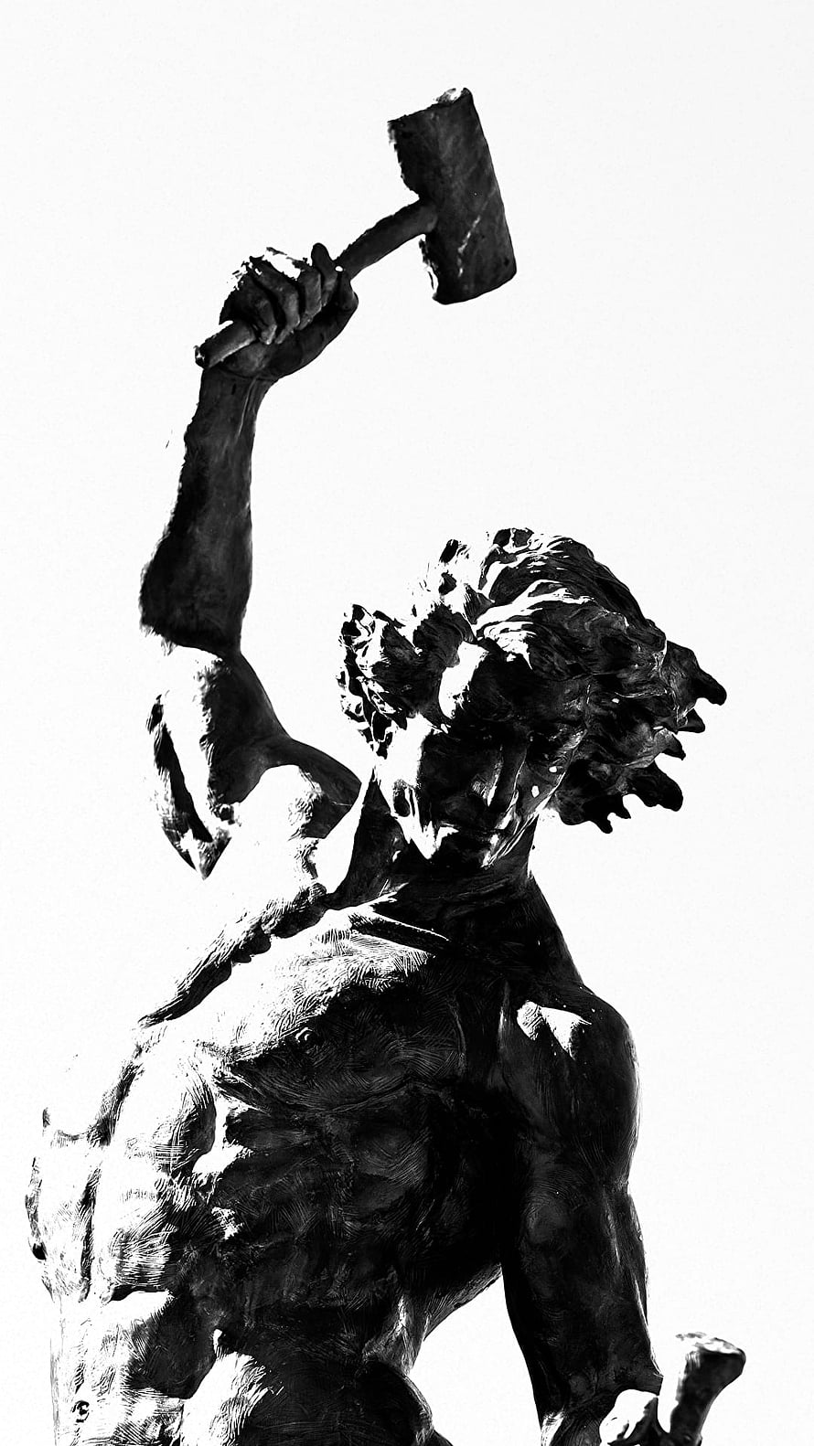 Self Made Man Sculpture: Dramatic Black and White Figure Raising a Hammer HD phone wallpaper