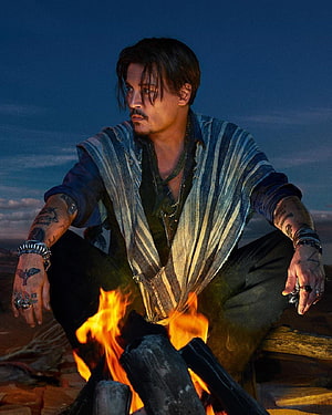 Johnny Depp in Dior Sauvage Campaign Sitting by Campfire at Dusk HD phone wallpaper