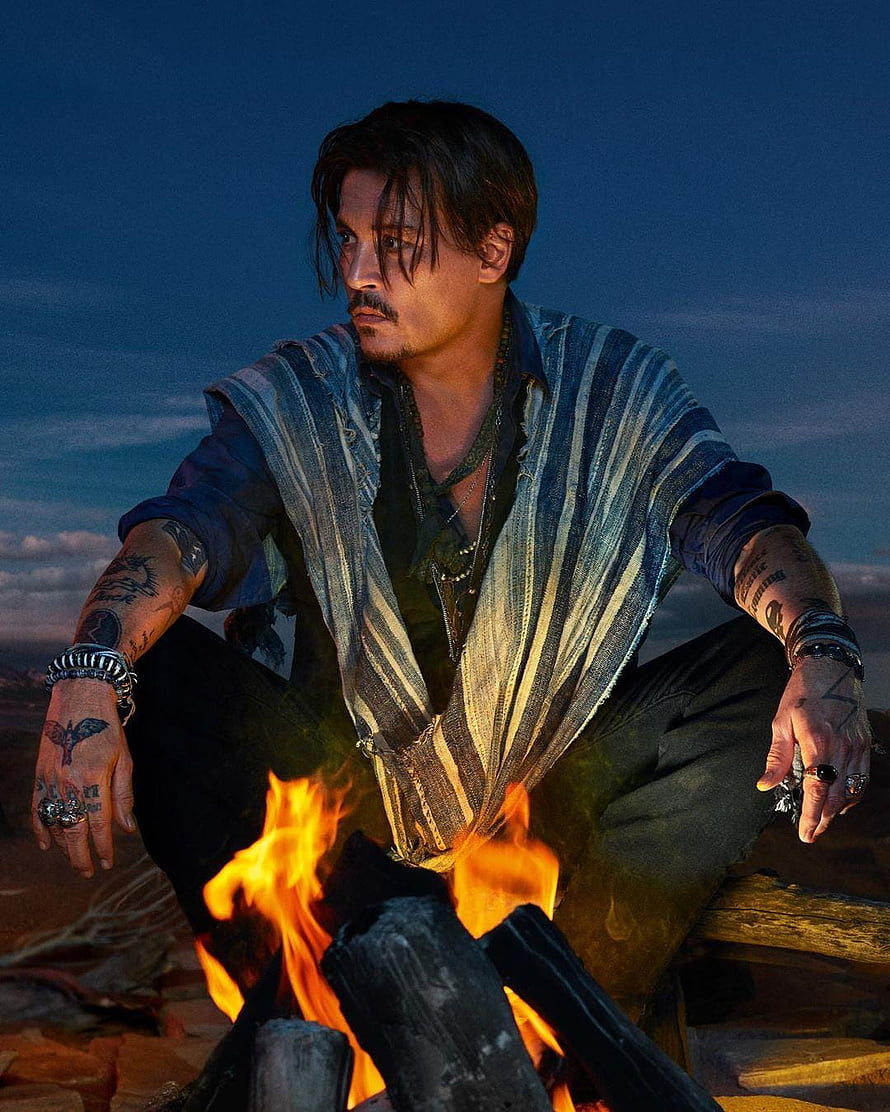 Johnny Depp in Dior Sauvage Campaign Sitting by Campfire at Dusk HD phone wallpaper