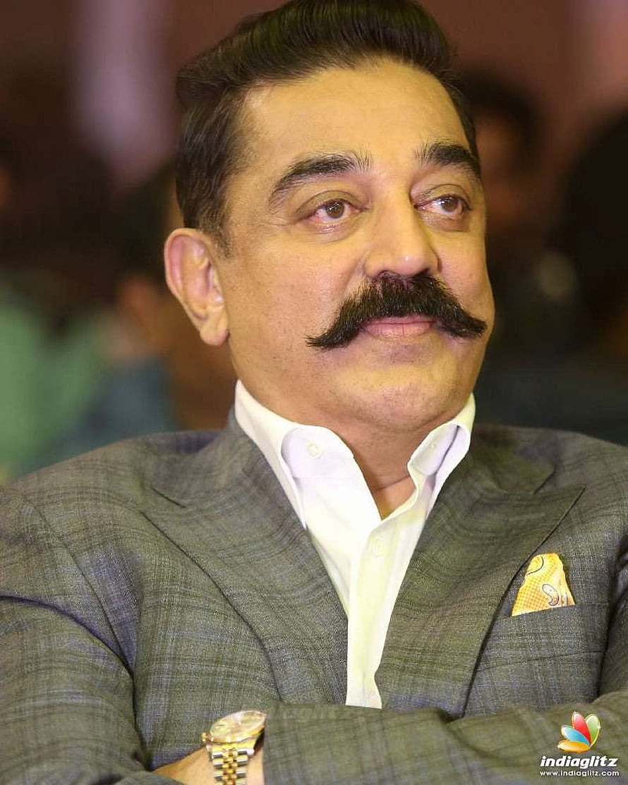 Kamal Haasan in a grey suit with a white shirt and gold watch HD phone wallpaper