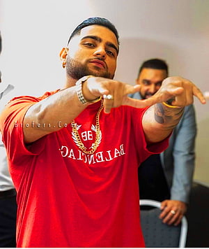 Karan Aujla in Red Balenciaga Tee Pointing Forward HD phone wallpaper