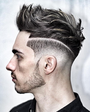 Modern Men's Undercut With Textured Top And Sharp Side Part HD phone wallpaper
