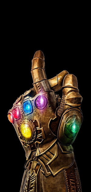 Thanos Infinity Gauntlet with Glowing Infinity Gems on Black Background HD phone wallpaper