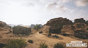 PUBG Miramar Desert Map Screenshot with Rustic Buildings and Rocky Terrain HD wallpaper