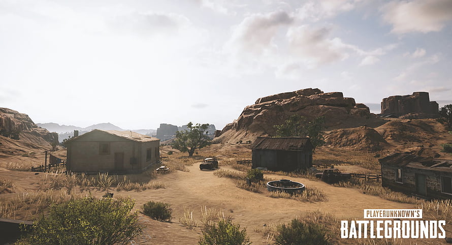 PUBG Miramar Desert Map Screenshot with Rustic Buildings and Rocky Terrain HD wallpaper