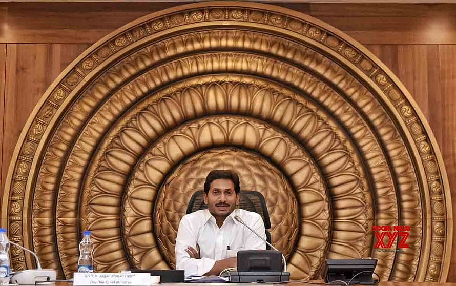Y.S. Jagan Mohan Reddy seated at official desk in Andhra Pradesh state chamber HD wallpaper