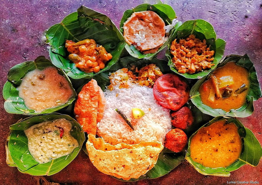 Traditional Odia Nuakhai Pitha Platter Served on Fresh Banana Leaves HD wallpaper