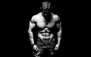 Black and White Portrait of a Muscular Shirtless Man with Dog Tags HD wallpaper